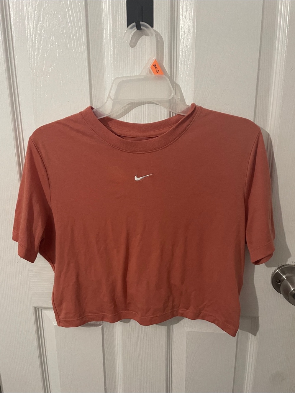 Nike Women's Cropped Tee with White Swoosh says it’s a AL but runs small- AM/AS